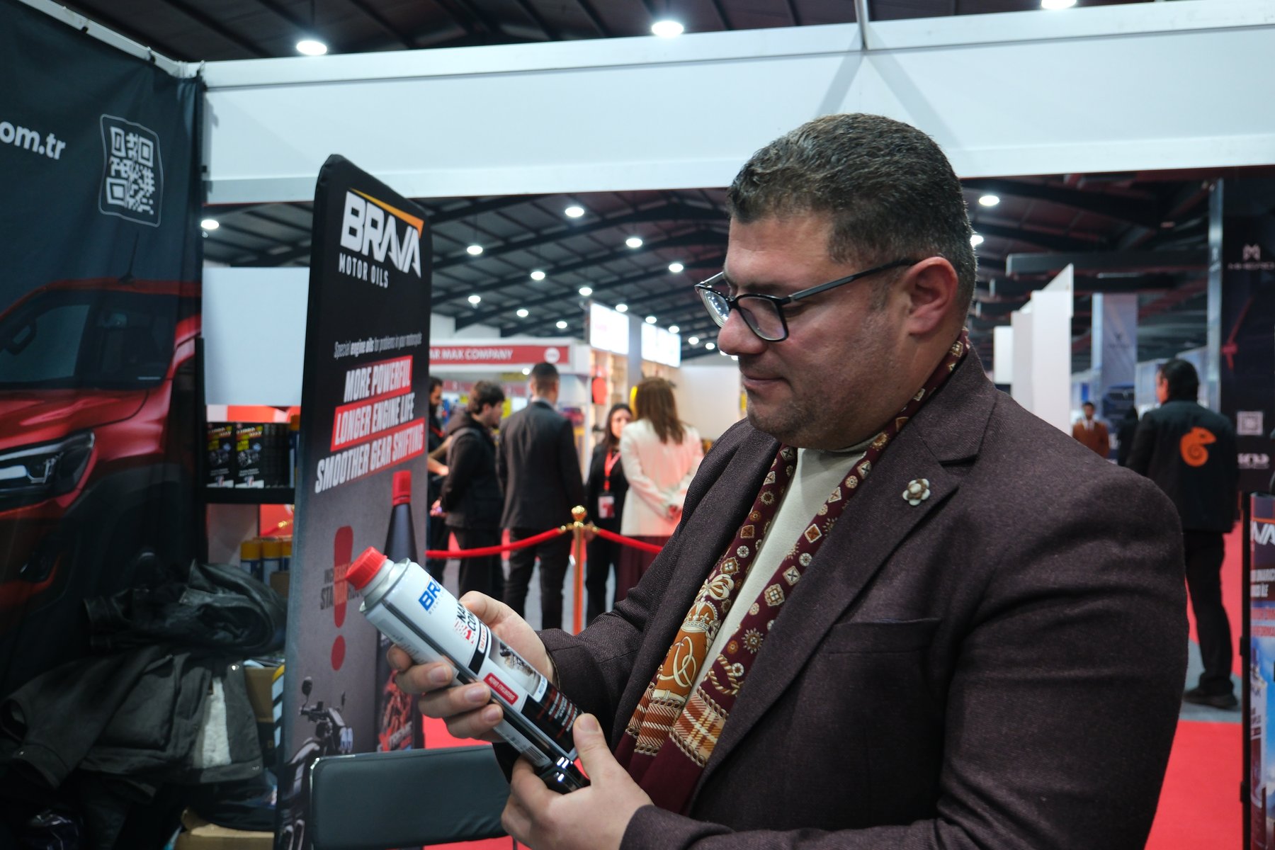 A buyer examining Brava NanoComplex at the stand