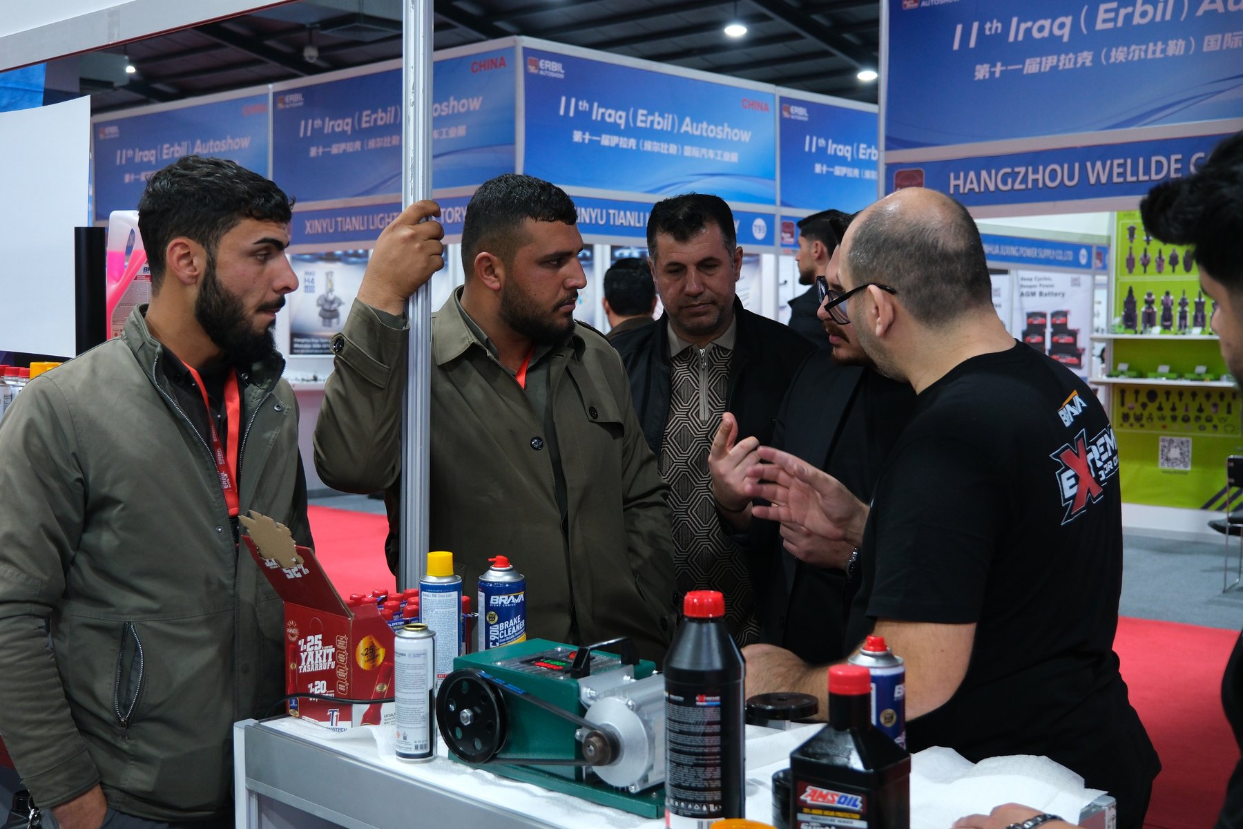 Visitors examining Brava products at the stand
